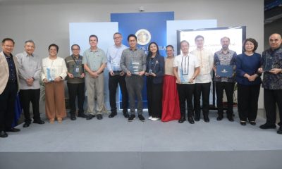 Ateneo de Manila University President Fr Roberto Yap SJ, Vice President for Education Dr Maria Luz C Vilches, and Assistant Vice President for Research, Creative Work, and Innovation Dr Filomeno Aguilar Jr (center) are flanked by (L-R) Ateneo School of Government Dean Dr Jennifer Oreta, School of Science and Engineering Dean Dr Raphael Guerrero, John Gokongwei School of Management Dean Dr Roberto Martin Galang, Rosita G. Leong School of Social Sciences Dean Dr Czarina Saloma-Akpedonu, School of Humanities Dean Dr Patricia Lambino, and Gokongwei Brothers School of Education and Learning Design Acting Dean Dr Maria Isabel Martin at the 2026 University Scholarly Work Awards. PHOTO: Rafa Lopez, OAVP-RCWI